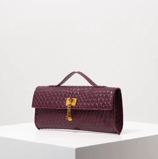 Bolso tipo clutch tricot